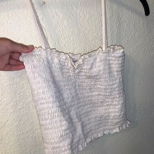 White ruffled tank